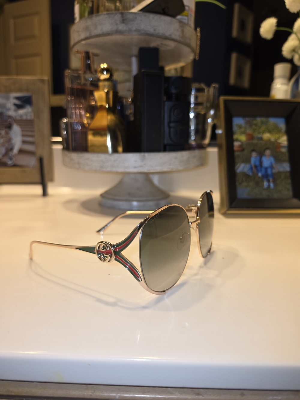 Gucci Women’s Round Sunglasses in Gold with Green and Red Stripe Accents